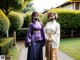 Two women dressed in traditional Japanese clothing standing next to each other.