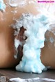 A close up of a man's face covered in foam.